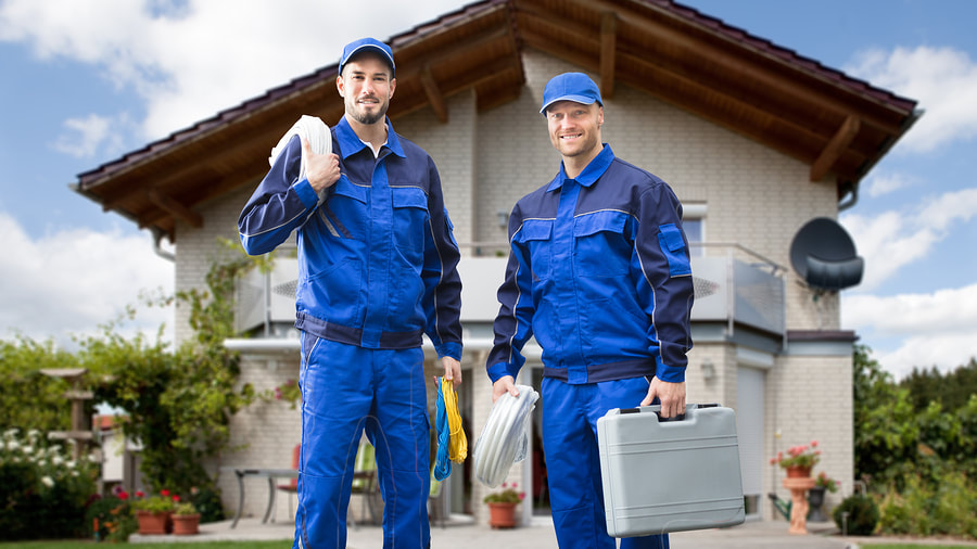 men holding electrical tools